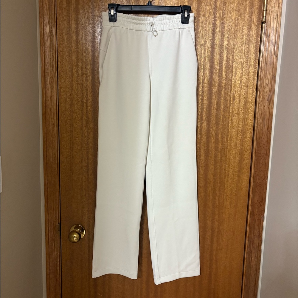 Lululemon softstreame highrise pant regular size 4 color “Bone” never worn.